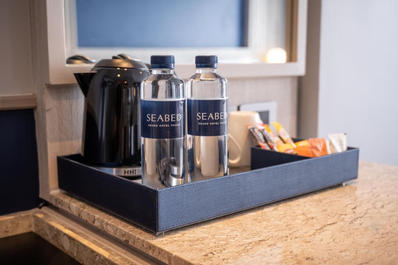 Seabed Grand Hotel Phuket - SHA Extra Plus Exterior foto SeaBear water bottles