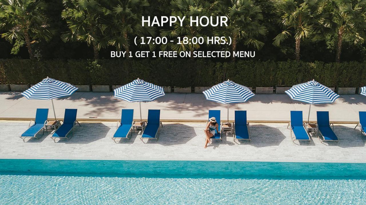 Seabed Grand Hotel Phuket - SHA Extra Plus Exterior foto Happy hour at a pool